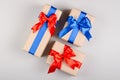 Gift box on gray background composition, present with ribbon and bow Royalty Free Stock Photo