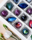 Gift box of handmade chocolates. Geometric and space design Royalty Free Stock Photo