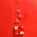 Gift box with heart shaped cookies and confetti Royalty Free Stock Photo