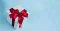 Gift box  on blue, cristmas blank background 2020 Royalty Free Stock Photo