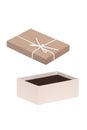 Gift box isolated. Close-up of a beige opened present or gift box with white ribbon bow isolated on a white background. Birthday, Royalty Free Stock Photo