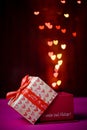 Gift box open shaped heart with Defocused bokeh colorful lights Royalty Free Stock Photo