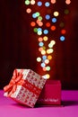 Gift box open shaped heart with Defocused bokeh colorful lights Royalty Free Stock Photo