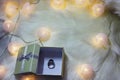 A gift box opened with a man ring, romantic lights Royalty Free Stock Photo