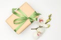 Gift box with orchid flower on white background Royalty Free Stock Photo