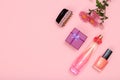 Gift box, perfume and cosmetics on a pink background Royalty Free Stock Photo