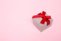 Gift box on pink background. March 8, mother`s day, valentine, christmas concept