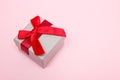 Gift box on pink background. March 8, mother`s day, valentine, christmas concept
