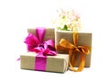 Gift box with pink ribbon bow and rose flower Royalty Free Stock Photo