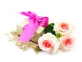 Gift box with pink ribbon bow and rose flower Royalty Free Stock Photo