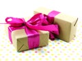 Gift box with pink ribbon bow and rose flower Royalty Free Stock Photo