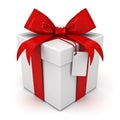 Gift box or present box with red ribbon bow and blank tag isolated on white background Royalty Free Stock Photo