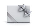 Gift box or present box with silver ribbon and bow isolated on white background Royalty Free Stock Photo