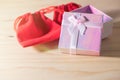 Gift box and Red Gift Bag wrapped Christmas and Newyear presents with bows and ribbons, Christmas frame boxing day background. Royalty Free Stock Photo