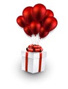Gift box on red balloons. Royalty Free Stock Photo