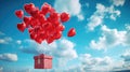Gift box on red heart balloons flying in sky Royalty Free Stock Photo
