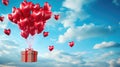 Gift box on red heart balloons flying in sky Royalty Free Stock Photo