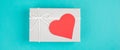 Gift box with a red heart, valentine day, birthday Royalty Free Stock Photo