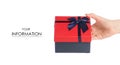Gift box with a red lid and a blue bow in hand pattern Royalty Free Stock Photo