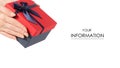 Gift box with a red lid and a blue bow in hand pattern Royalty Free Stock Photo