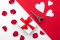 Gift box, red paper hearts . Valentine`s Day absctract. Symbol of love. Copy space, flat lay