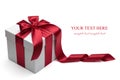 Gift box with red ribbon and bow.