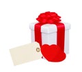 Gift box with red ribbon, hearts and tag (label) isolated Royalty Free Stock Photo