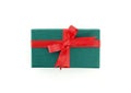 small green gift box with red ribbon bow isolated on white background Royalty Free Stock Photo