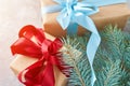 Gift box with a ribbon and christmas tree branch, top view Royalty Free Stock Photo