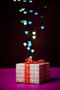 Gift box shaped heart with Defocused bokeh colorful lights Royalty Free Stock Photo