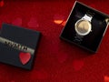 Gift box with silver watch is on red heart paper background