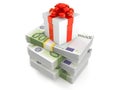 Gift box on stack of money Royalty Free Stock Photo