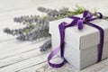 Gift box with violet ribbon