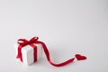 Gift box on the white background. Red ribbon. Valentines Day . Isolated