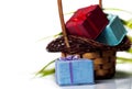 Gift boxes and wicker basket Royalty Free Stock Photo