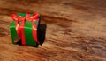 Gift box on wooden background Royalty Free Stock Photo