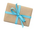 Gift box wrapped in brown recycled paper with blue ribbon top vi Royalty Free Stock Photo
