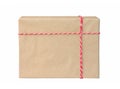 Gift box wrapped in brown recycled paper with red and white rope. Present, packaging. Royalty Free Stock Photo