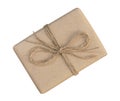 Gift box wrapped in brown recycled paper and tied sack rope top Royalty Free Stock Photo