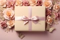 A gift box on pink background with paper flowers Royalty Free Stock Photo