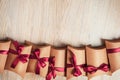 Gift box wrapped in kraft paper with ribbon bow Royalty Free Stock Photo