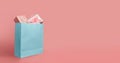 Gift boxes in blue paper shopping bag Royalty Free Stock Photo