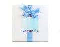 Gift boxes with blue ribbons on a white background