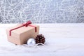 Gift boxes with bow and christmas balls on wood background. Decoration Royalty Free Stock Photo