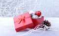 Gift boxes with bow and christmas balls on wood background. Decoration Royalty Free Stock Photo