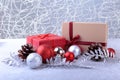 Gift boxes with bow and christmas balls on wood background. Decoration Royalty Free Stock Photo