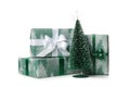 Gift boxes and Christmas tree isolated on white background Royalty Free Stock Photo