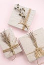 Gift boxes decorated dried flowers top view. Holidays present greeting concept Royalty Free Stock Photo