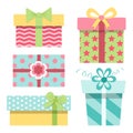 Cute wrapped paper gift boxes with bows and ribbons Royalty Free Stock Photo