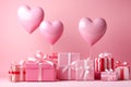 Gift boxes and heart shaped baloons in a pink studio. Valentine's day, women's day, baby gender reveal